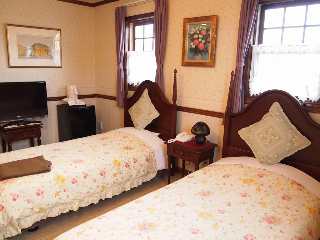 Petit Hotel Corinthian Rebun Camera foto