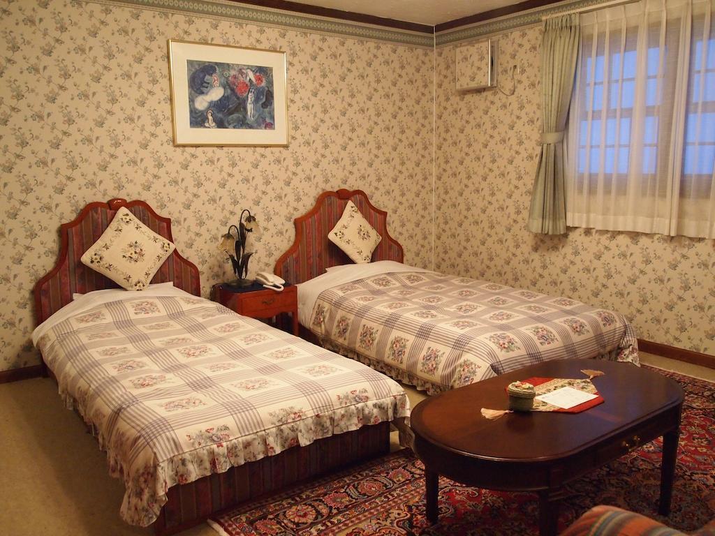 Petit Hotel Corinthian Rebun Camera foto
